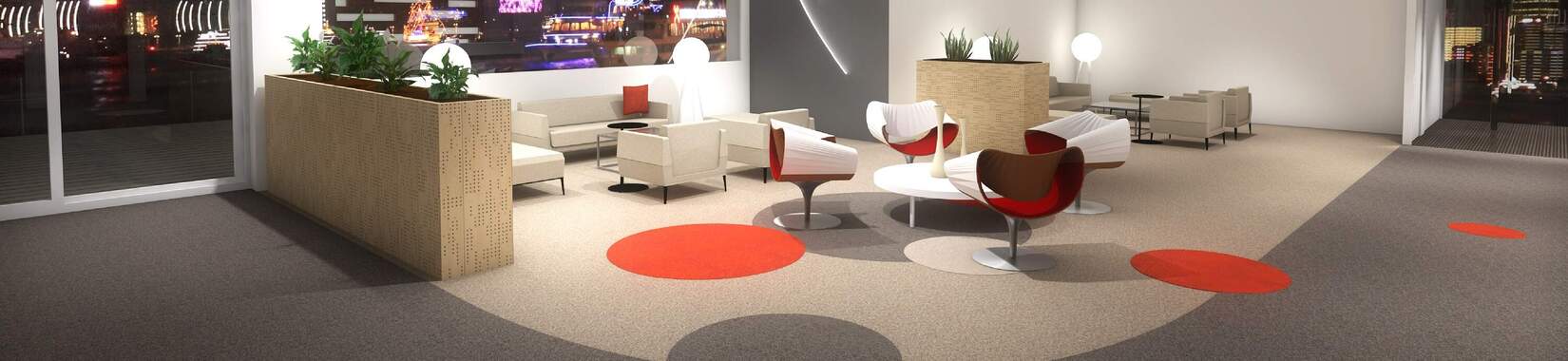 Kugelgarn flooring creatively laid with two optical areas in brown and beige with orange accents